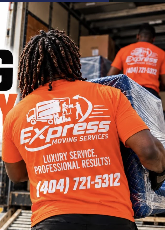 Express Moving Services movers carrying wrapped furniture toward a truck